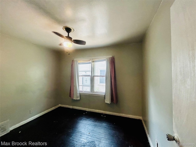 22510 Frisbee St, Detroit, MI 48219 - empty room with dark wood-style floors and ceiling fan
