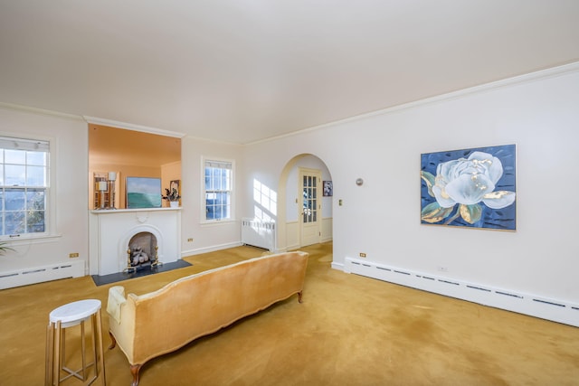 106 Rust Ave, Big Rapids, MI 49307 - carpeted living area with arched walkways, ornamental molding, baseboard heating, and plenty of natural light