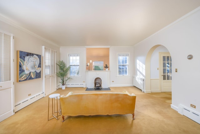 106 Rust Ave, Big Rapids, MI 49307 - living room with a baseboard radiator, ornamental molding, arched walkways, and carpet floors