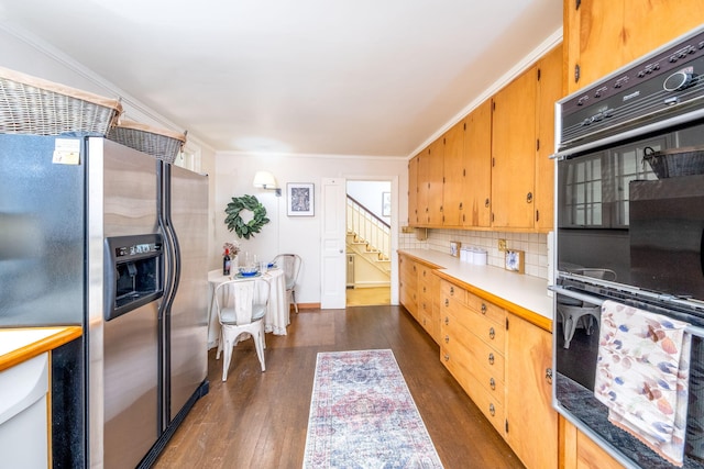 106 Rust Ave, Big Rapids, MI 49307 - kitchen with stainless steel refrigerator with ice dispenser, dark wood-style flooring, decorative backsplash, ornamental molding, and light countertops