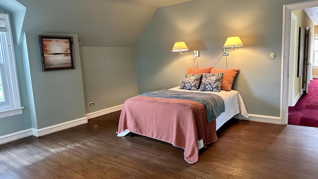 106 Rust Ave, Big Rapids, MI 49307 - bedroom featuring wood finished floors and vaulted ceiling