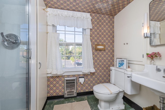 106 Rust Ave, Big Rapids, MI 49307 - full bathroom with heating unit, a shower stall, and tile walls