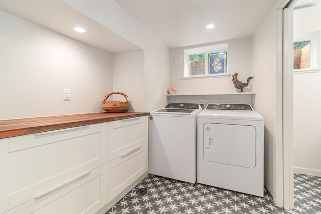 2659 Bedford Rd, Ann Arbor, MI 48104 - laundry room featuring light flooring, washing machine and clothes dryer, cabinet space, and recessed lighting