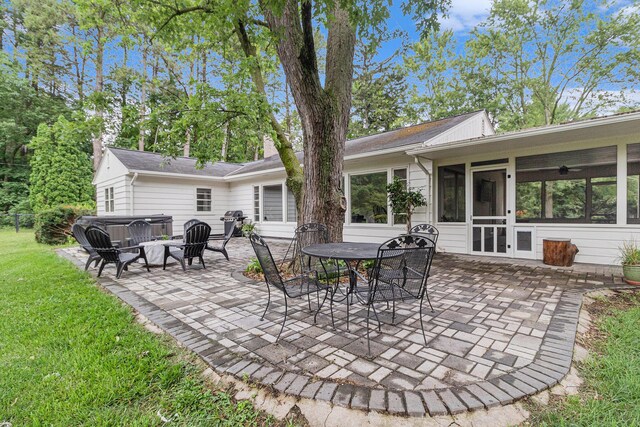 2659 Bedford Rd, Ann Arbor, MI 48104 - view of patio / terrace featuring a sunroom and area for grilling