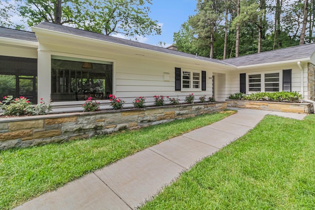2659 Bedford Rd, Ann Arbor, MI 48104 - view of front of house featuring a front yard