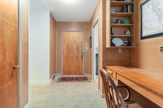2659 Bedford Rd, Ann Arbor, MI 48104 - entryway featuring baseboards and light tile patterned floors