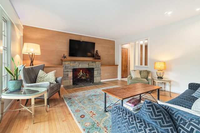 2659 Bedford Rd, Ann Arbor, MI 48104 - living room featuring wood finished floors, a fireplace, and recessed lighting