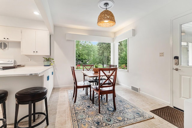 2659 Bedford Rd, Ann Arbor, MI 48104 - dining area with light tile patterned flooring and recessed lighting
