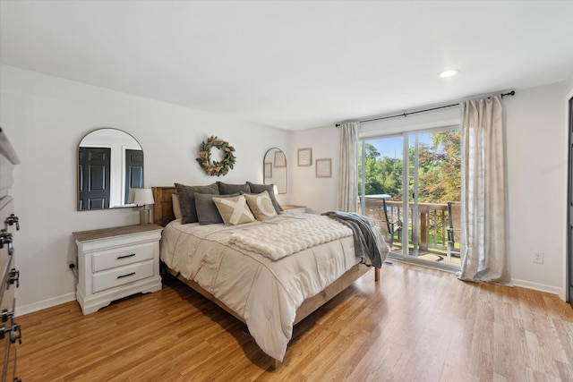 1393 Shankin Dr, Walled Lake, MI 48390 - bedroom featuring access to exterior, light wood-style flooring, and recessed lighting