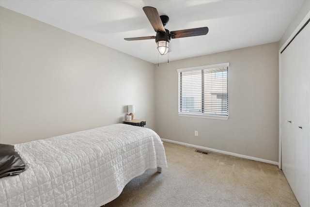 1393 Shankin Dr, Walled Lake, MI 48390 - bedroom with a closet, light carpet, and ceiling fan