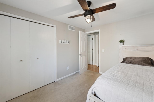 1393 Shankin Dr, Walled Lake, MI 48390 - bedroom featuring light colored carpet, a closet, and ceiling fan