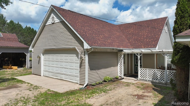 3733 N Hoover Ave, Gladwin, MI 48624 - view of front of property with a shingled roof