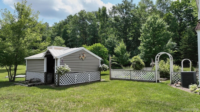 3733 N Hoover Ave, Gladwin, MI 48624 - view of green lawn featuring an outbuilding