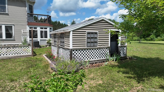 3733 N Hoover Ave, Gladwin, MI 48624 - view of grassy yard with a balcony