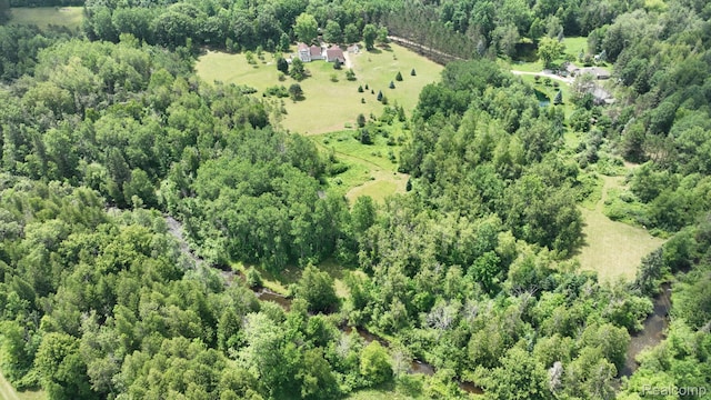 3733 N Hoover Ave, Gladwin, MI 48624 - aerial overview of property's location with a heavily wooded area