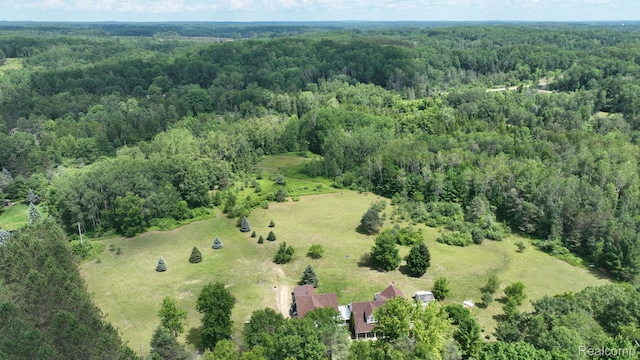 3733 N Hoover Ave, Gladwin, MI 48624 - aerial overview of property's location with a heavily wooded area