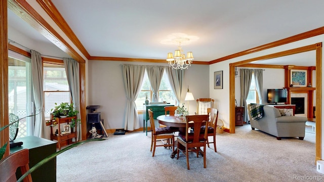 3733 N Hoover Ave, Gladwin, MI 48624 - carpeted dining area featuring a chandelier and ornamental molding