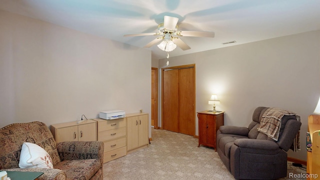 3733 N Hoover Ave, Gladwin, MI 48624 - sitting room with light carpet and a ceiling fan