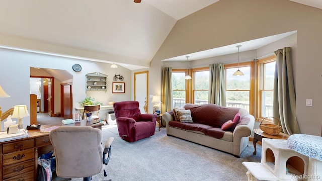 3733 N Hoover Ave, Gladwin, MI 48624 - living room featuring carpet flooring and vaulted ceiling
