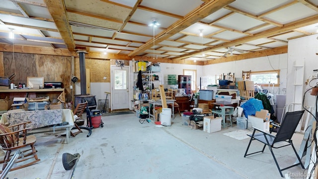 3733 N Hoover Ave, Gladwin, MI 48624 - garage with a wood stove