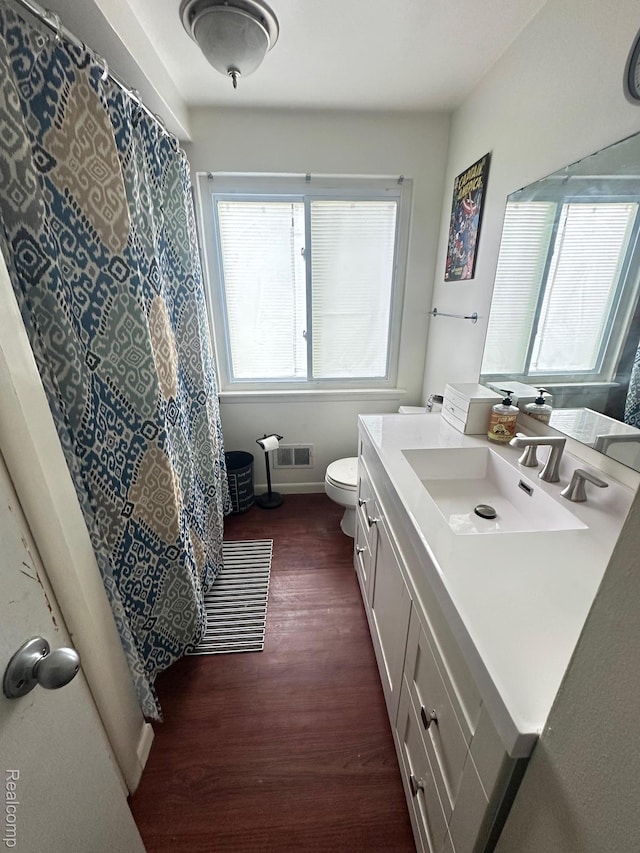 5076 Spring Well Ln, Grand Blanc, MI 48439 - full bathroom featuring wood finished floors and vanity