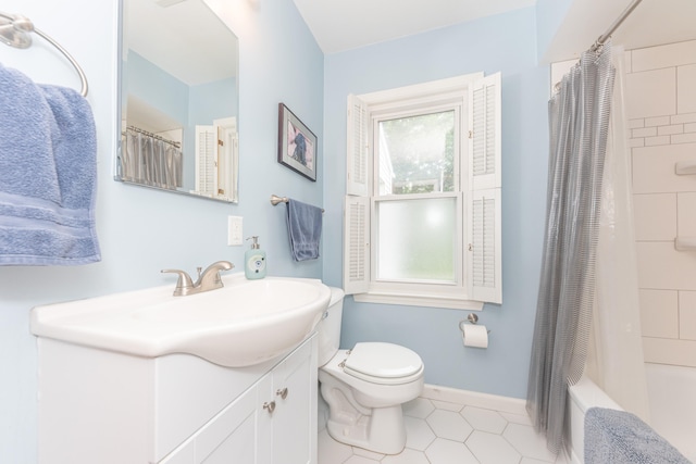 2100 Alice St, Ann Arbor, MI 48103 - bathroom with vanity, healthy amount of natural light, tile patterned flooring, and shower / bath combination with curtain