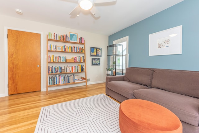 2100 Alice St, Ann Arbor, MI 48103 - living room with light wood finished floors and a ceiling fan