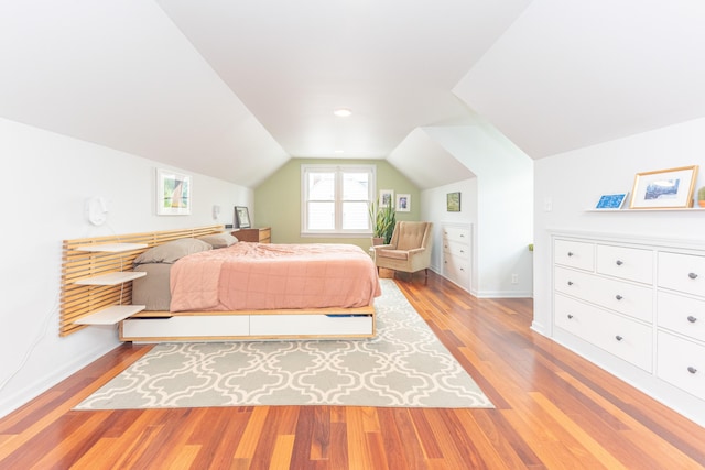 2100 Alice St, Ann Arbor, MI 48103 - bedroom featuring light wood-style flooring and vaulted ceiling