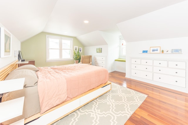 2100 Alice St, Ann Arbor, MI 48103 - bedroom featuring wood finished floors and vaulted ceiling