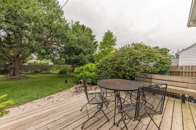 2100 Alice St, Ann Arbor, MI 48103 - wooden deck featuring a fenced backyard and outdoor dining area