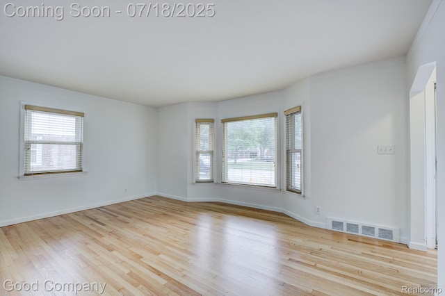 923 E 4th St, Royal Oak, MI 48067 - spare room with wood finished floors and baseboards