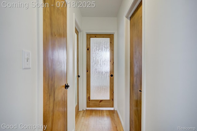 923 E 4th St, Royal Oak, MI 48067 - doorway to outside with light wood-type flooring and baseboards