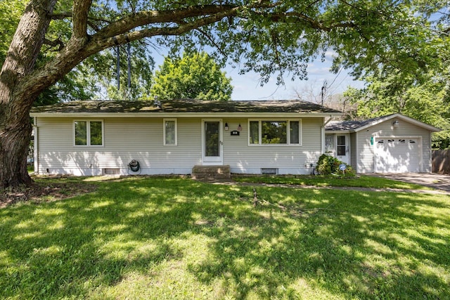 11 Geiger Ave, Battle Creek, MI 49037 - single story home with entry steps, a front yard, a garage, and driveway