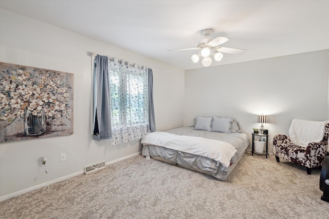 11 Geiger Ave, Battle Creek, MI 49037 - carpeted bedroom with ceiling fan and baseboards