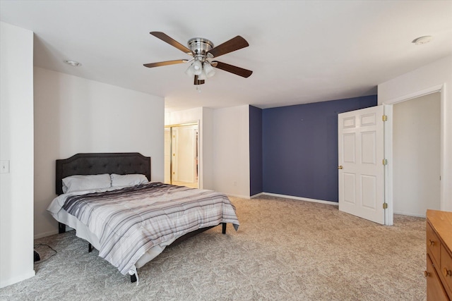 11 Geiger Ave, Battle Creek, MI 49037 - bedroom featuring light colored carpet and a ceiling fan
