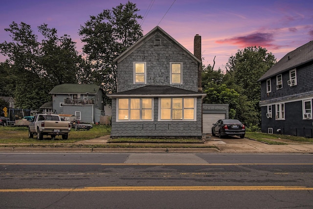1850 S Burdick St, Kalamazoo, MI 49001 - view of front facade with a chimney and stone siding