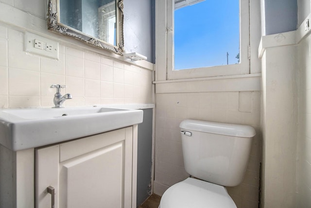 1850 S Burdick St, Kalamazoo, MI 49001 - bathroom with tile walls and vanity