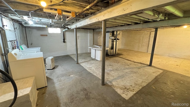71 Cloveridge Dr, Troy, MI 48084 - basement featuring washing machine and clothes dryer
