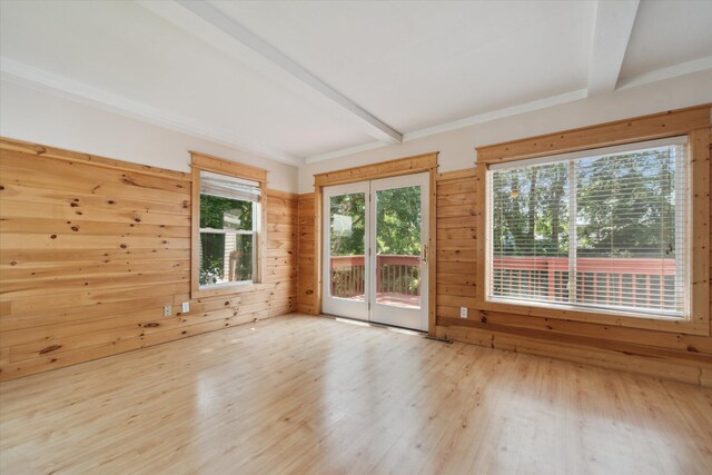 222 E Mill St, Hastings, MI 49058 - unfurnished room featuring beamed ceiling, wood finished floors, and wooden walls