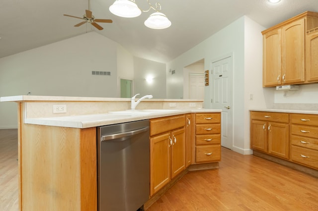 1803 Bell Rd, Niles, MI 49120 - kitchen with stainless steel dishwasher, light wood-style flooring, light countertops, ceiling fan, and vaulted ceiling