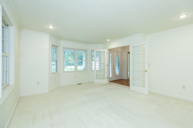 1803 Bell Rd, Niles, MI 49120 - carpeted empty room featuring french doors, ornamental molding, and recessed lighting