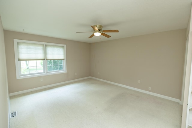 1803 Bell Rd, Niles, MI 49120 - spare room featuring a ceiling fan and light carpet