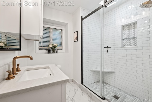309 S Dorchester Ave, Royal Oak, MI 48067 - bathroom featuring marble look tiles, a stall shower, and vanity