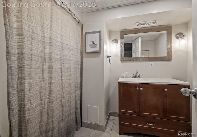309 S Dorchester Ave, Royal Oak, MI 48067 - full bathroom featuring vanity, tile patterned flooring, and a shower with curtain
