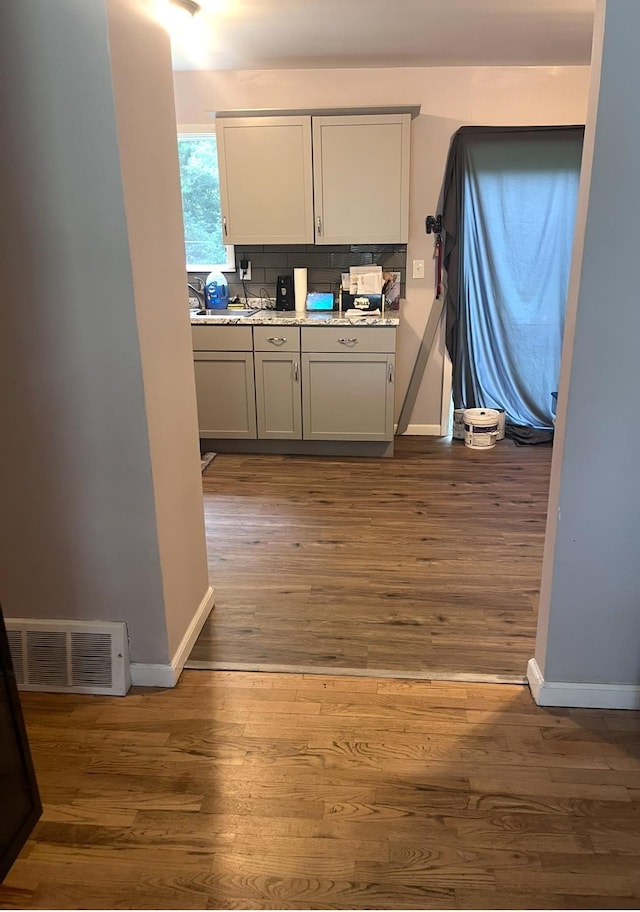 2032 Daron Pl, Flint, MI 48505 - kitchen with wood finished floors and light countertops