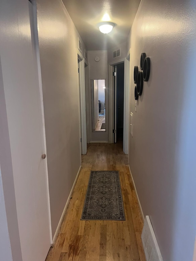 2032 Daron Pl, Flint, MI 48505 - corridor featuring wood finished floors and baseboards