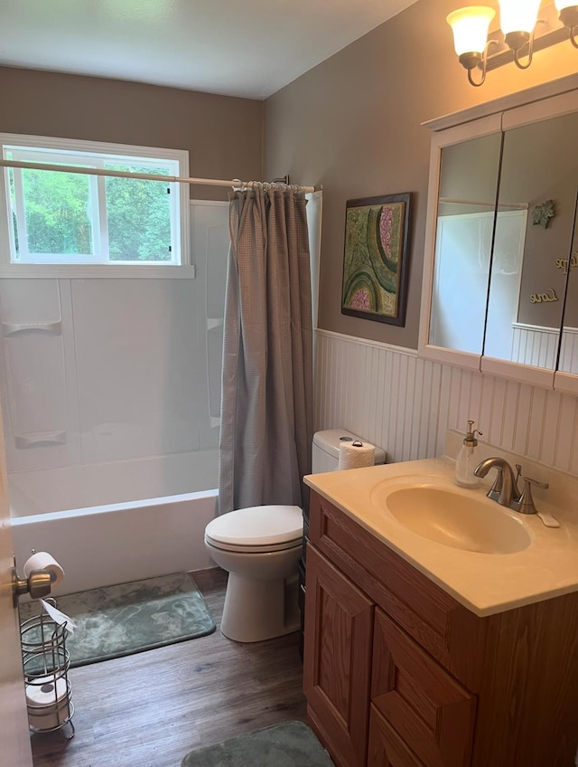 2032 Daron Pl, Flint, MI 48505 - full bath with vanity, wainscoting, wood finished floors, and shower / bath combination with curtain