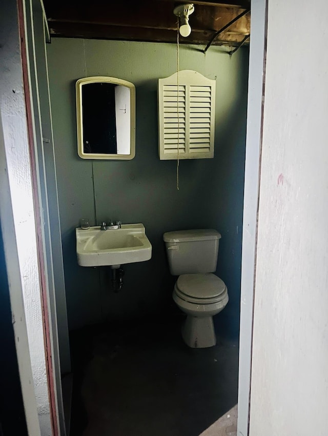 2032 Daron Pl, Flint, MI 48505 - half bath with concrete flooring