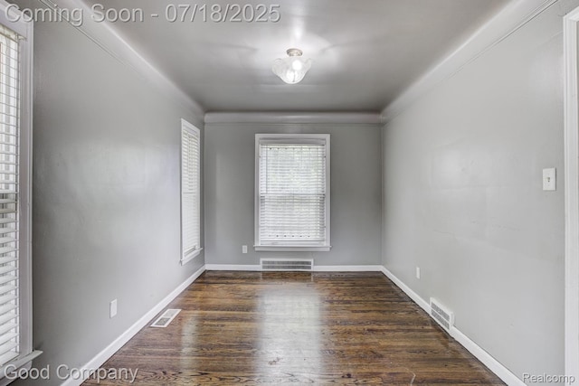 21797 Moross Rd, Grosse Pointe, MI 48236 - empty room with wood finished floors and baseboards