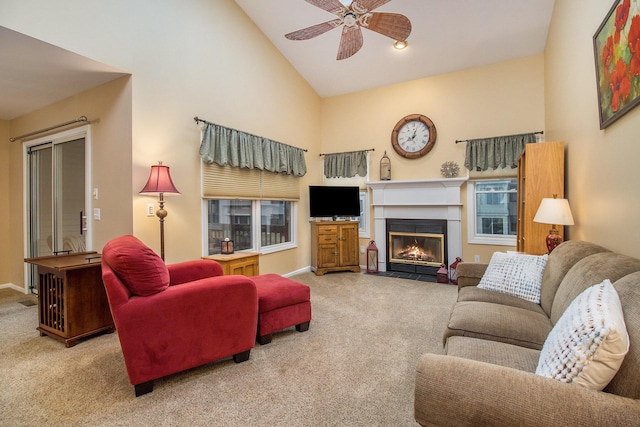 3542 Kirkaldy Cir, Portage, MI 49024 - living area with carpet floors, a ceiling fan, high vaulted ceiling, and a fireplace with flush hearth